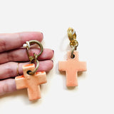 PENDIENTES CROSS NARANJA (Pieza única)